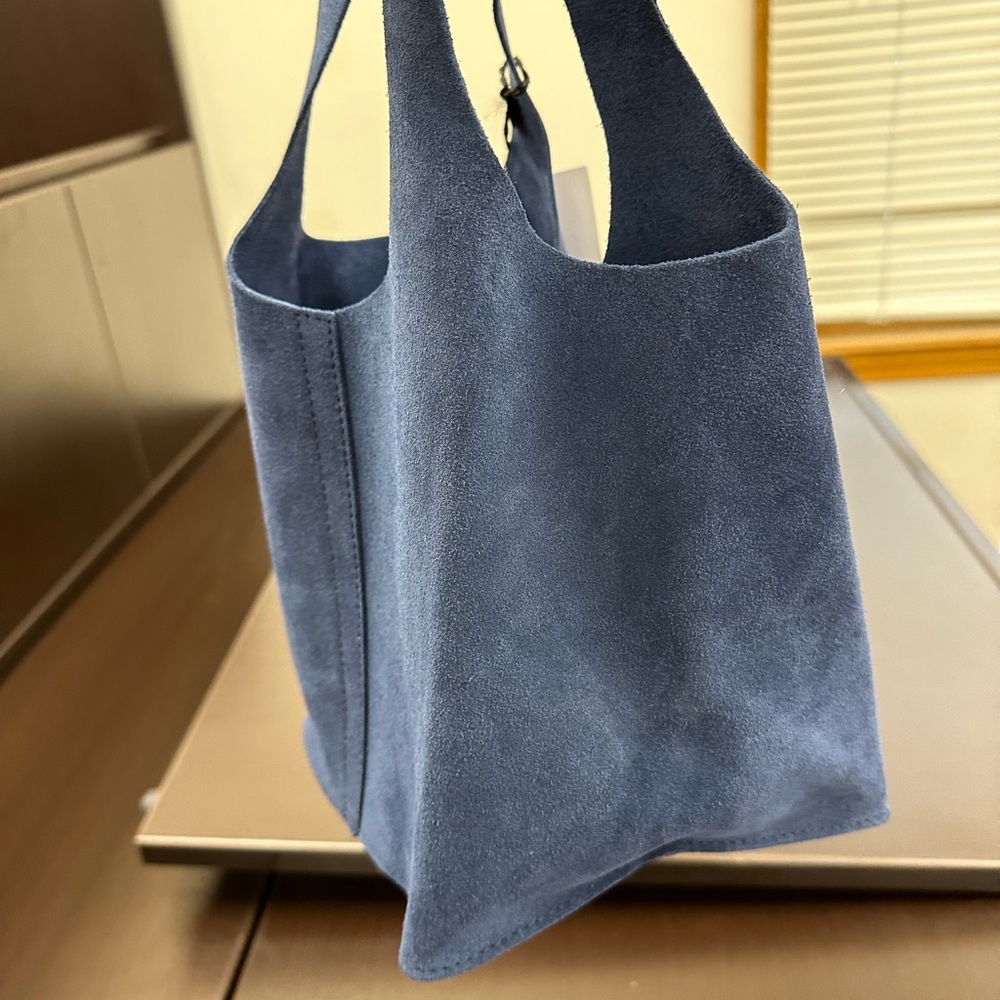 Beautiful blue suede bucket bag